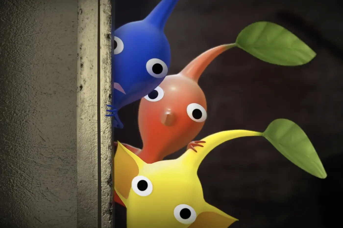 Verschillende kleine wezens (pikmin) in verschillende kleuren